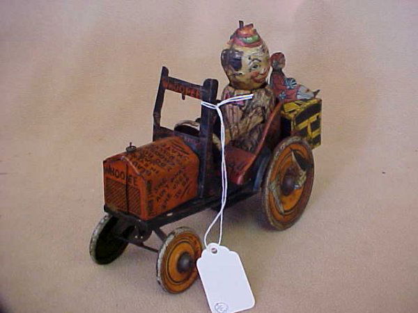 Marx Woppie Varsity car wind-up working: Marx Woppie Varsity car wind-up working. Sometime's the windup slips. Tin litho with minor scratches from age & usage. Measures 7-1/2"long x 6"tall x 3"wide.