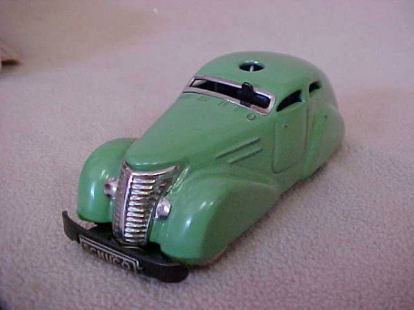 Late 1940's U.S. Zone Germany Schuco clockwork pow: Late 1940's U.S. Zone Germany Schuco clockwork power remote control. New w/box. Measures 4-1/4"long x 1-1/2"tall x 1-1/2"wide.