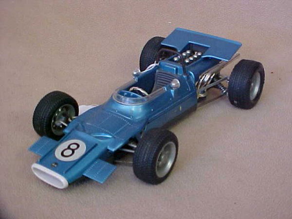 1960's BMW Schuco Formula race car. #8: 1960's BMW Schuco Formula race car. Original paint & graphic's. Normal scratches from age & usage. Measures 9-1/2"long x 2-1/2"tall x 4-3/4"wide.