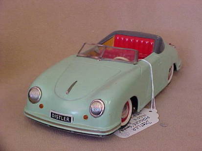 Distler Porsche "Speedster" 1950's new in box ve: Distler Porsche "Speedster" 1950's new in box very rare. battery power, key, 2 foward sppeds & reverse. Mint conditon. Measures 9-3/4"long x 2-3/4"tall x 4-1/2"wide.