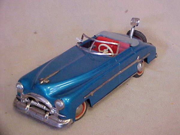 Schuco Daimler U.S. Zone Germany car.: Schuco Daimler U.S. Zone Germany car. Original paint. Normal wear to paint from age & condition. Measures 10"long x 3-1/4"tall x 3-3/4"wide.