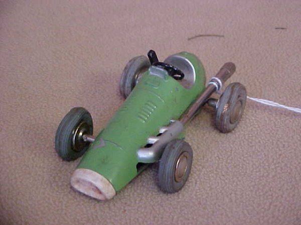 Pre 1952 U.S. Zone Germany clockwork race car Schu: Pre 1952 U.S. Zone Germany clockwork race car Schuco. Minor scratchs from age & usage. Measures 3-1/2"long x 1-1/2"tall x 2"wide.