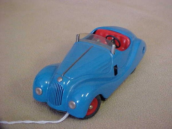 Schuco West Germany car w/original box mint.: Schuco West Germany car w/original box mint. 4 speed w/neutral & reverse, handbrake, steering all working. Measures 5-1/2"long x 2"tall x 2-1/2"wide.