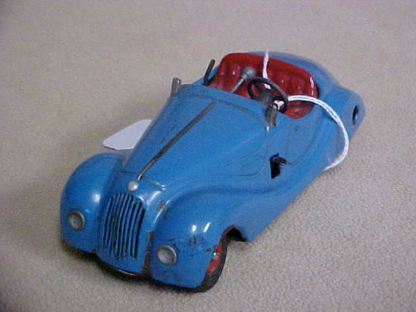 Schuco Examico 4001 Steerable car.: Schuco Examico 4001 Steerable car. Minor scratches from age & usage. Measures 5-1/2"long x 2"tall x 2-1/2"wide.