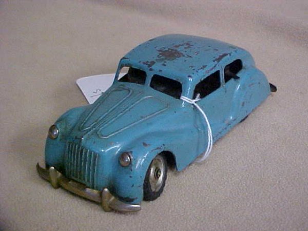 1950's French programmable clockwork "Safar" M1: 1950's French programmable clockwork "Safar" M1 3000 sedan. Paint scratches from age & usage. Measures 6-3/4"long x 2-1/4"tall x 2-3/4"wide.