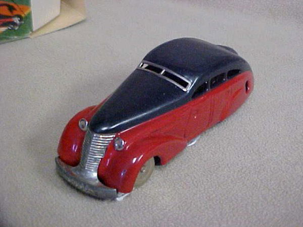 Schuco #1010 wind up car w/box.: Schuco #1010 wind up car w/box. Mint w/original box. Measures 5-1/2"long x 1-3/4"tall x 2"wide.