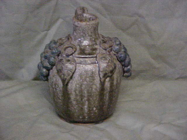 John & Mildred meaders small jug w/grapes decoratio: Scarce John & Mildred Meaders small grape decorated jug. Great conditon, great size and stunning form. Measures 5-1/2"tall x 4-1/2".