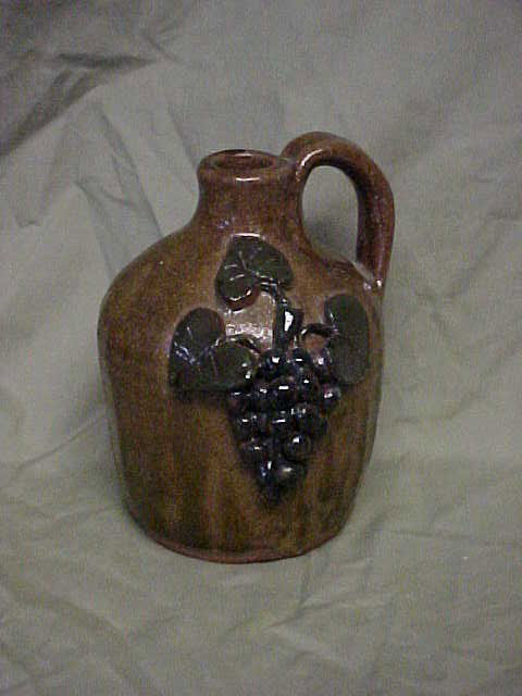 Jessie Meaders grape jug alkaline glaze.: Jessie Meaders grape jug alkaline glaze. Good condition. Measures 6"tall x 5"wide.