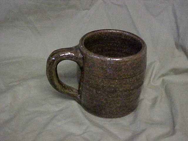 Lanier Meaders alkaline glaze mug w/incised ring.: Lanier Meaders alkaline glaze mug w/incised ring on shoulder. Mint conditon. Measures 3-1/2"tall x 5"wide.