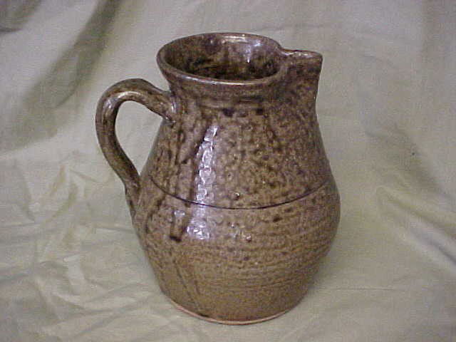 Lanier Meaders alkaline glazed pitcher: Lanier Meaders alkaline glazed pitcher. Good condition. Measures 7-1/4"tall x 6"wide.