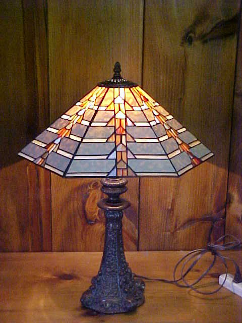 Med. Tiffany Style Leaded Glass Lamp: Quality Reproduction Med. Tiffany Style Leaded Glass Lamp w/ Decorative Bronze Base Measures 20" x 25 1/2"high