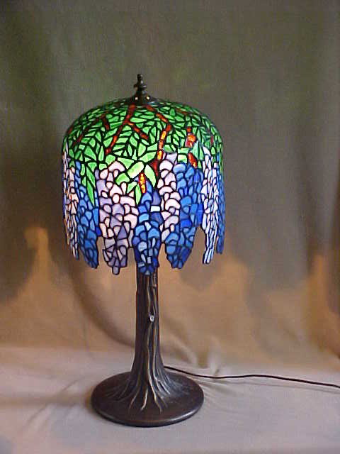 Med. Tiffany Style Leaded Glass Lamp : Quality Reproduction Med. Tiffany Style Leaded Glass Lamp w/ Tree Design Bronze Base Measures 11" x 22 1/2"high