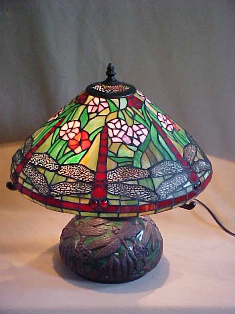 Med. Dragonfly Design Tiffany Style Lamp: Quality Reproduction Med. Dragonfly Design Tiffany Style Leaded Glass Lamp w/ Leaded Glass & Bronze Base Measures 16" x 16 1/2"high