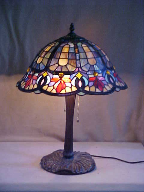 Med. Tiffany Style Leaded Glass Lamp: Med. Tiffany Style Leaded Glass Lamp w/ Bronze Base Quality Reproduction Measures 16" x 20 1/2"high