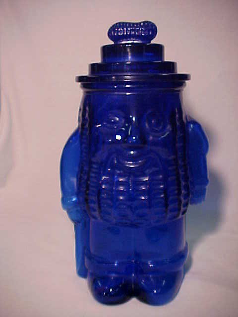 U.S. Glass Co. Cobalt blue Peanut man Cookie jar.: U.S. Glass Co. Cobalt blue Peanut man Cookie jar. Measures 12-1/2"tall x 7-1/2"wide.