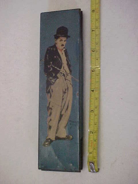 Early Charlie Chaplin tin lithographed pencil box 1: Early Charlie Chaplin tin lithographed pencil box 1920s. Marked by Henry Clive. Scratches & wear from age & usage.