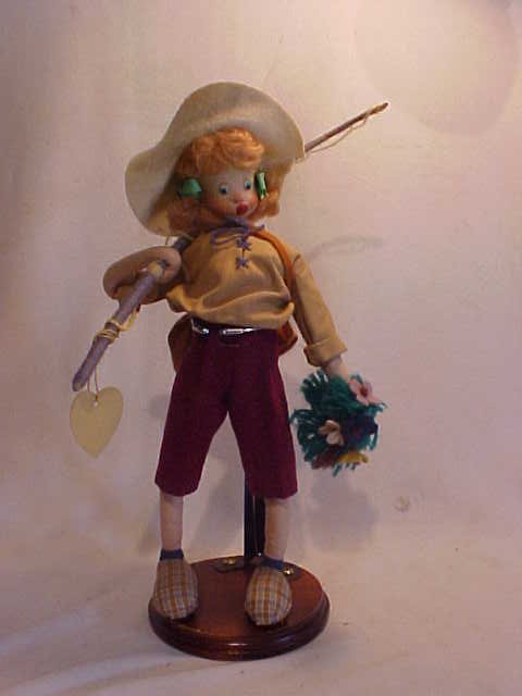 "Nature-loving girl" Klumpe doll (Spain) w/stand: "Nature-loving girl" Klumpe doll (Spain) with stand. Original tag. Distributed by Effanbee. Measures 12" tall