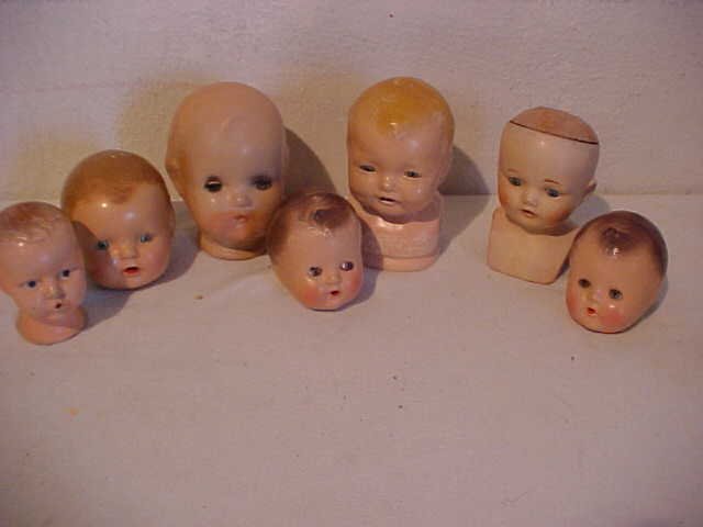 Lot of 7 early doll heads: Lot of 7 early doll heads. Some signed Effanbee, Bubbles, 1924, E.I.Horsman co. Toodles. Various sizes