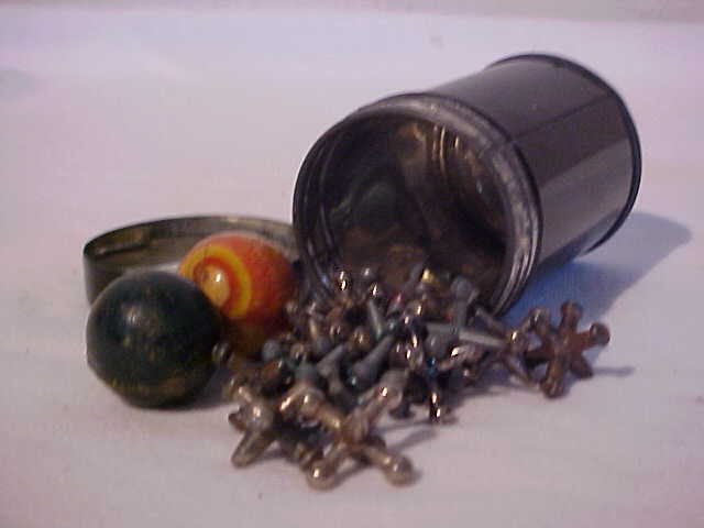 Early small tin on jacks: Early small tin on jacks. Includes 2 balls and 17 jacks. Measures 3" tall x 2"