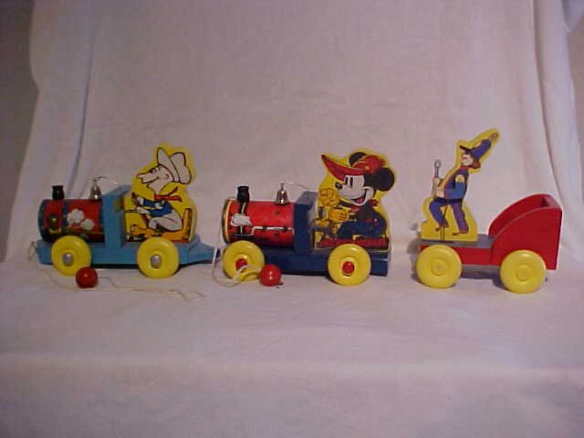 Lot of 3 handcrafted/painted wooden pull toys: Lot of 3 handcrafted/painted wooden pull toys. Measurements up to 7"H x 9"L