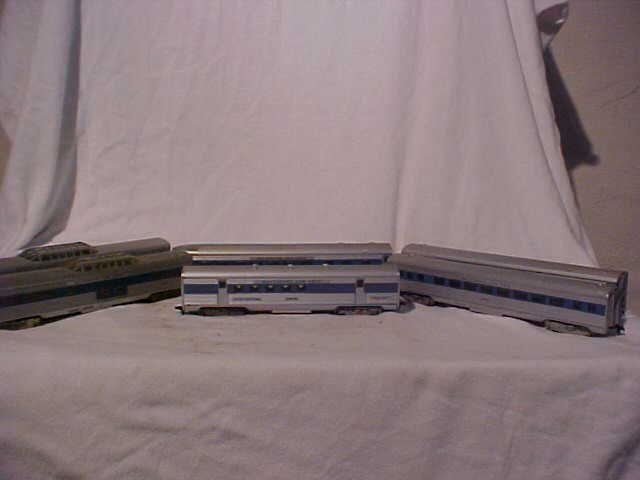 Lot of 6 model train cars: Lot of 6 model train cars. Consists of: Baltimore & Ohio, Santa Fe, US railway postal service, Railway Express Agency Inc. HO scale. Measures 2 1/4"H x 1 1/2"W x 8 1/4 - 10 1/4"L