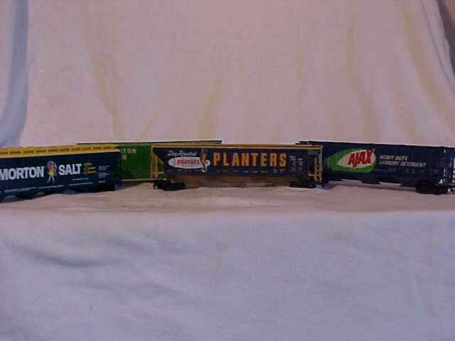 Lot of 4 Tyco Model Train Cars: Lot of 4 Tyco Model Train Cars Excellent Condition ,Models Burlington Northern100024, Moton Salt ACFX 62004, AJAX Union Pacific 431 101, Planters SAL 23090 Measurements Varies From 2" x 6 3/4" - * 1/4
