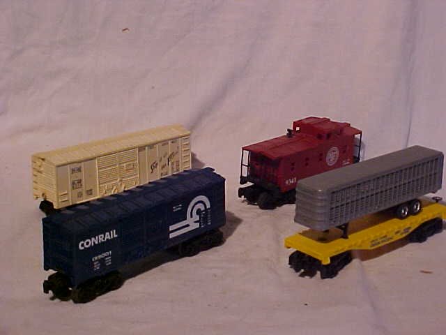 Lot of 4 Lionel Model Train Cars: Lot of 4 Lionel Model Train Cars Good Condition Including SLSF 6014, Conrail CR9001, Atlantic Coast Line 9341 Caboose and Union Pacific Trailer Flat Car Measures 3"-3 3/4"h x 2"w x 7"-8 1/2"L
