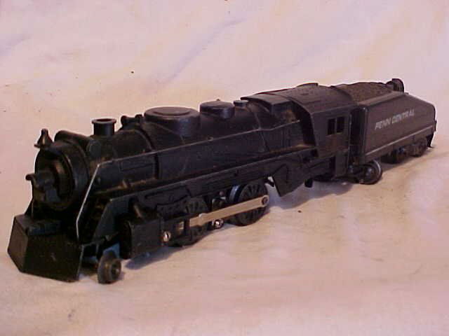 Marx Penn Central Model Train Engine: Marx Penn Central Model Train Engine 0/0-27 Scale Still Works Good Condition Some Paint Touched Up Measures 3"h x 2 1/2"w x 16"L