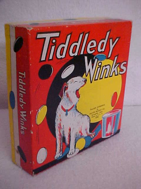 Milton Bradley "Tiddley Winks" game: Milton Bradley "Tiddley Winks" game. Measures 2"H x 6 1/2" x 6"