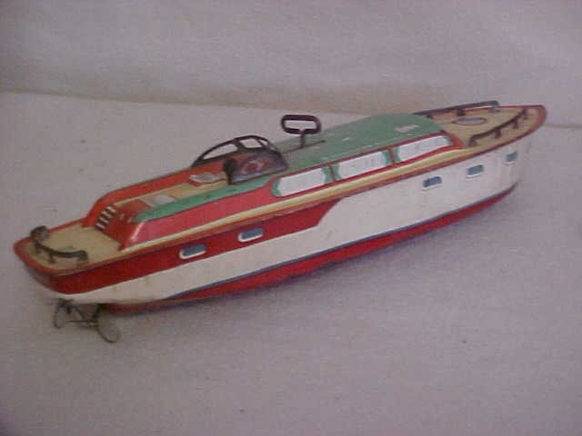 J Chein tin litho "Princess Pat" wind up boat: J Chein tin litho "Princess Pat" wind up boat. Measures 15"L x 4 1/2"