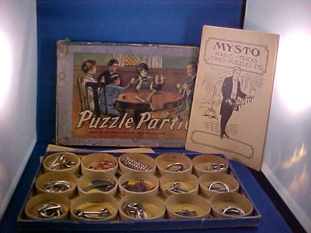 Rare & Complete w/box Puzzle Parties game.: 1935 Rare & Complete w/box Puzzle Parties game. Set has all metal puzzle pieces, manuals/insturctions. Box shows signs of wear & age. Overall good condition. Great graphics.
