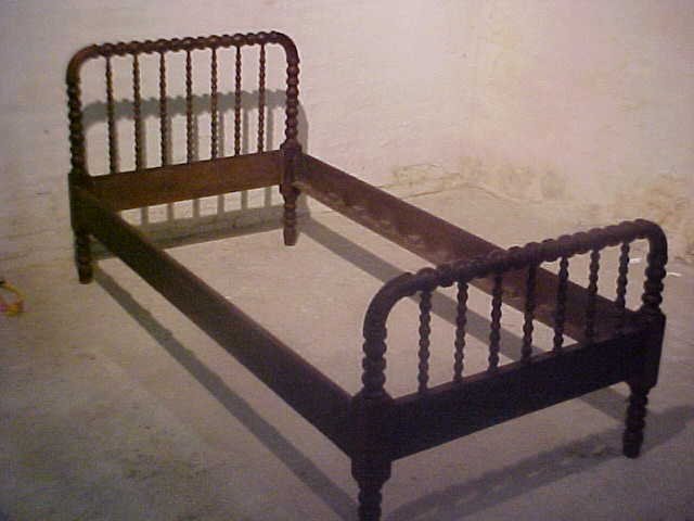 1930's Jenny Lynn twin size bed.: 1930's Jenny Lynn twin size bed. Possible early restoration. correct rails. Measures 34-1/4"tall x 37"wide x 78-1/4"long.