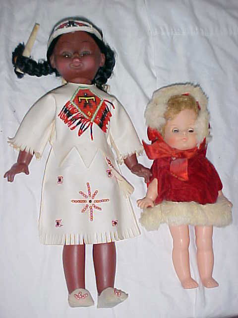 Lot of 2 plastic dolls Native American & Christm: Lot of 2 plastic dolls Native American & Christmas. 17" & 12"tall.