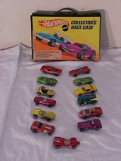 Lot of 13 Red Line Hot Wheels cars.: Lot of 13 Red Line Hot Wheels cars. Used condition with scratches & wear from age & usage. (1)1969 Swinging Wing, (1) 1969 Sand Crab, (1) 1974 Yellow #38 Race car, (1) 1970 The Hood, (1) 1968 Turbo Fi