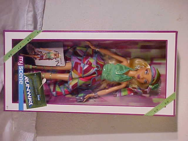 Project runway Barbie: Project runway Barbie in box. Box 13 1/2 tall x 6 1/2 wide x 3 deep.