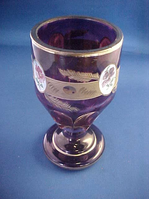 Dark purple art glass vase w/gold decorations. 5-1/4": Dark purple art glass vase w/gold decorations. 5-1/4" Enameled panels.