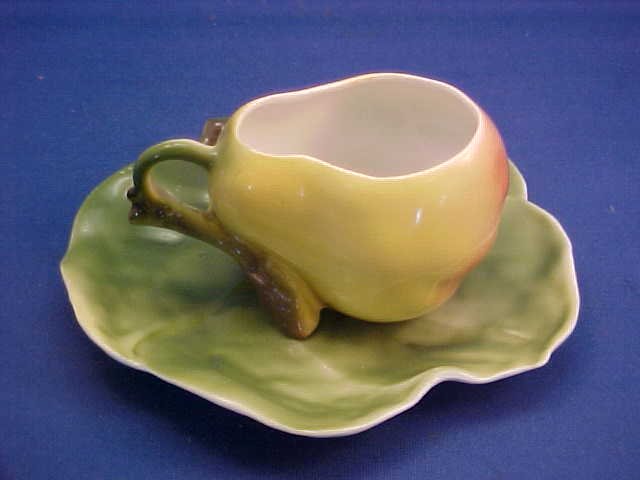 Royal Bayreuth Yellow/Red Pear cup and saucer: Royal Bayreuth Yellow/Red Pear cup and saucer. Measures 4-1/2" wide