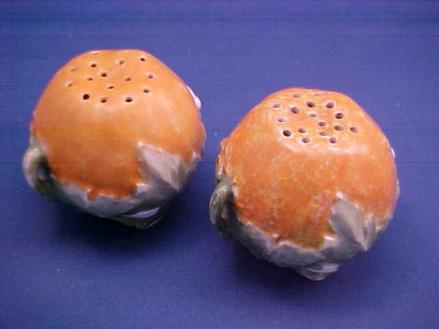 Royal Bayreuth Orange 2-1/4"t Salt and Pepper: Royal Bayreuth Orange 2-1/4"t Salt and Pepper. No markings. Does have corks