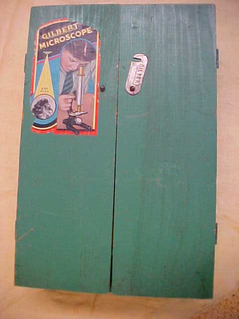 Vintage Gilbert Microscope set in wooden case.: Vintage Gilbert Microscope set in wooden case. Contains vials, micoscope & other misc original items. Original lable w/lock.