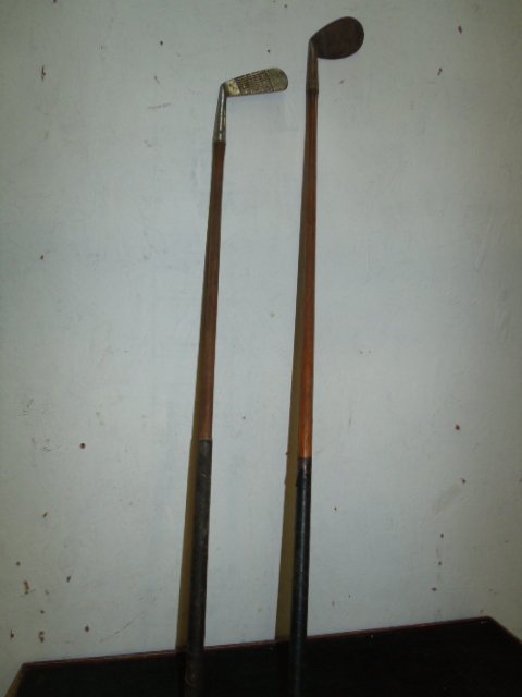 Set of 2 Vintage Wood Shaft Golf Clubs: Set of 2 Vintage Wood Shaft Golf Clubs. Measures 35" and 38-1/2" long