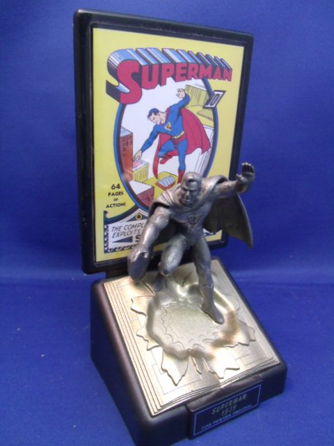 DC Comics Pewter Superman Statue and Stand: DC Comics Pewter Superman Statue and Stand. Measures 7" tall x 3-1/2" wide x 3" deep