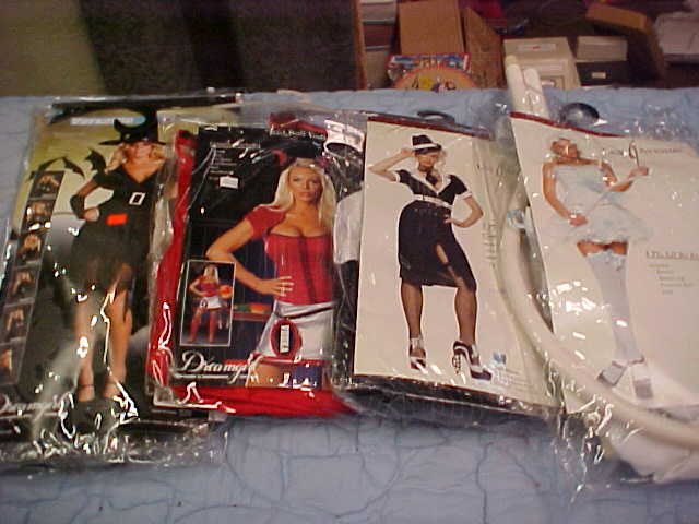 Lot of 4 assorted adult medium-large costumes: Lot of 4 assorted adult medium-large costumes. Witch, bull, gangster, and bo peep