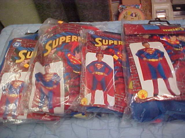 Lot of 4 kid's large superman costumes: Lot of 4 kid's large superman costumes
