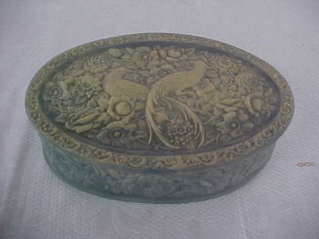 Incolay stone hand carved box: Incolay stone hand carved box. Measures 3\" tall x 10\" wide.