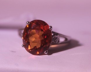 Exquisite Sterling Silver Ring with Lab Orange Sapphire: 925 Sterling Ring - Lab Orange Sapphire; Gemstone 3.50 ct twt; Diamond .5 ct dwt