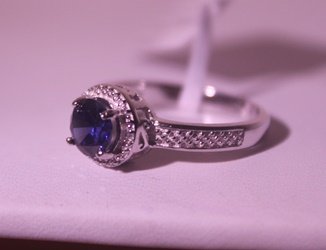 Exquisite Sterling Silver Ring with Lab Blue Sapphire: 925 Sterling Ring - Lab Blue Sapphire; Gemstone 1.45 ct twt; Diamond .5 ct dwt