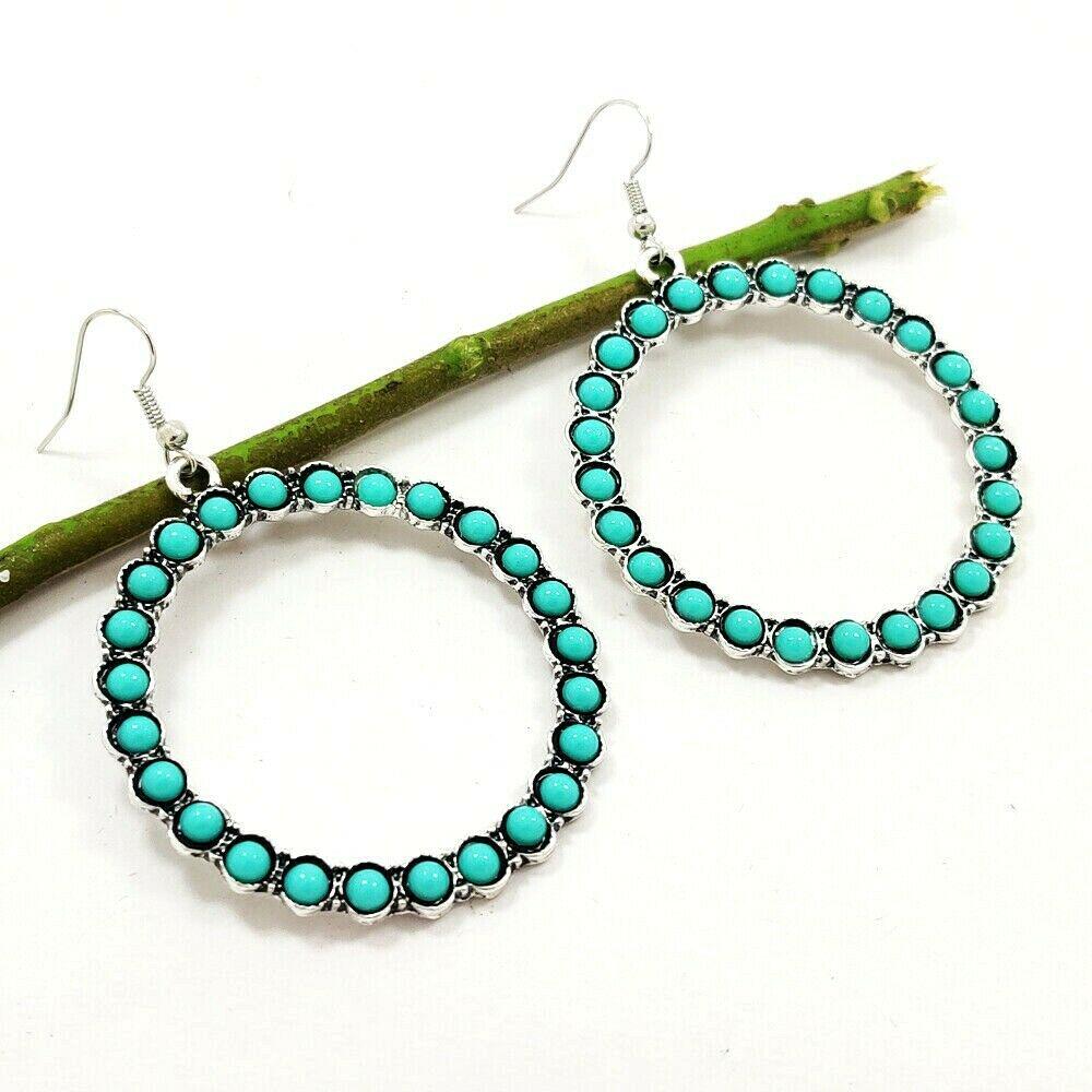 TURQUOISE GEMSTONE SILVER PLATED EARRING: Jewelry Type : Earring , Gemstone : Turquoise , Gemstone Color : Blue , Gemstone Shape : Round , Gemstone Size : 4x4 MM , Metal Purity : Silver Plated , Base Metal : White Brass , Earring Type : Hook 