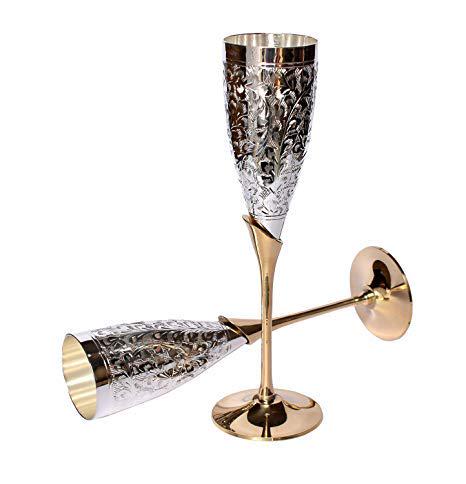 Siver Plated Champagne Flute Wine Glass - Set of 2: Bring home this elegantly designed silver plated goblet flute wine glasses by crockery wala and company is not only elegant but also keeps a check on your health by resisting the bacteria growth since