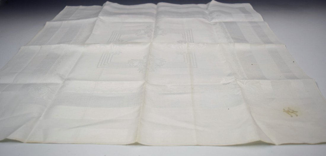 Adolf Hitler Personal Dinner Napkin: A personal linen dinner napkin owned and used by Adolf Hitler Napkin is inscribed with the initials of AH designed by Albert Speer Measures: 23 x 22 inches This napkin was acquired in 1945 and was sen