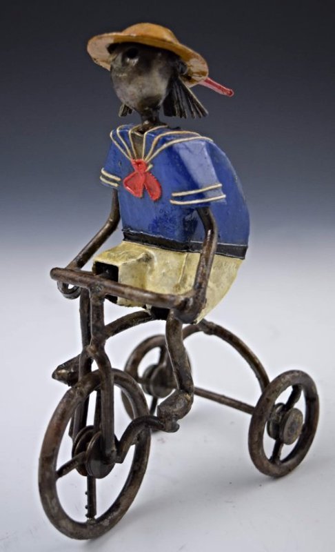 Manuel Felguerez Sculpture: Metal and paper mache sculpture "Boy on Tricycle" Measures 8 inches